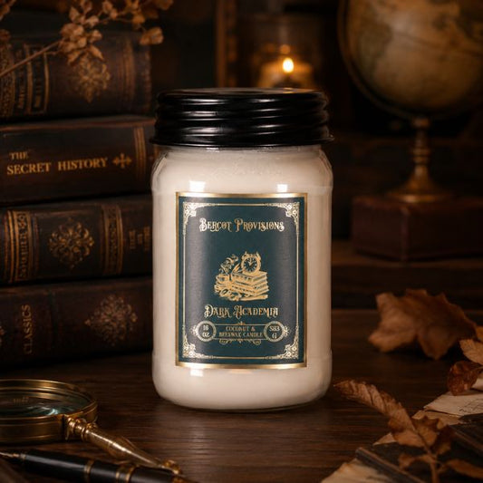Dark Academia 16 oz candle styled in a dark moody aesthetic background