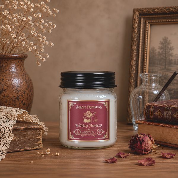 Jar candle with a label on a wooden surface with decorative items