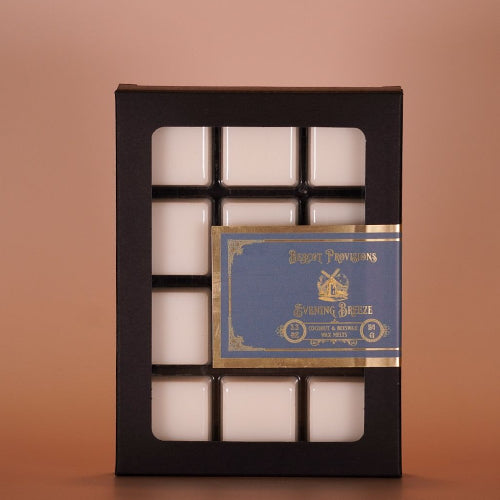 Set of white wax metls in a black box with a visible brand label on a brown background