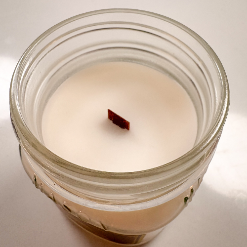 Candle with Coconut wax, beeswax, wooden wicks in a mason jar.