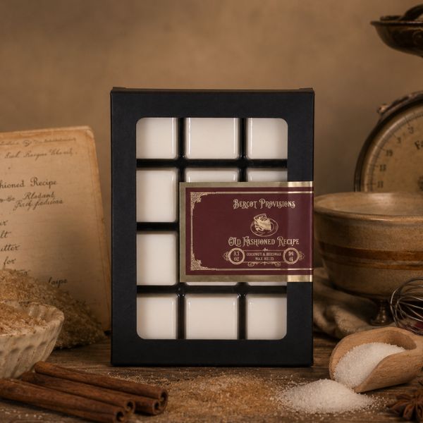 Box of Bercot Provisions wax melts on a rustic background with ingredients for baking like the scent.